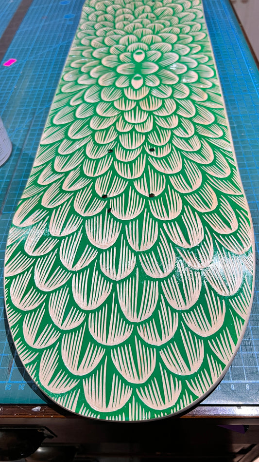 Hand-carved skateboard deck